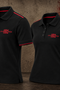 Two black short-sleeve polo shirts displayed on invisible mannequins against a textured brown and red background. Both shirts feature red piping along the collar and sleeve cuffs, and a red embroidered logo on the left chest reading '1904 EST.