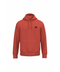 A rust-orange pullover hoodie with a small black circular graphic on the left chest, displayed on a clean white background.