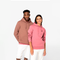 A man and a woman modeling matching pink and dusty rose hoodies against a clean white studio background.