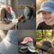 A six-panel collage showcasing children's baseball caps in different settings and colors. The panels include a smiling child wearing a light blue cap, a close-up of a light blue cap texture, a stack of pastel caps (pink, blue, green, gray) on a dark surface, a green cap hanging on a wooden rack, and a gray cap resting on a mossy log in a forest.