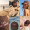 A six-panel collage showcasing a dark brown baseball cap with pink embroidered text reading 'LATE BUT GREAT' in various beach and outdoor lifestyle settings, including on a beach boardwalk, on sand with seashells, worn by a smiling woman, over clear water, and on a pink beach towel with a drink and book.