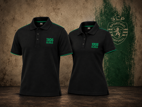 Two black short-sleeve polo shirts with green trim and '1906 GLAMORA' printed on the chest, displayed side by side against a textured brown wall with a green Sporting Portugal crest.
